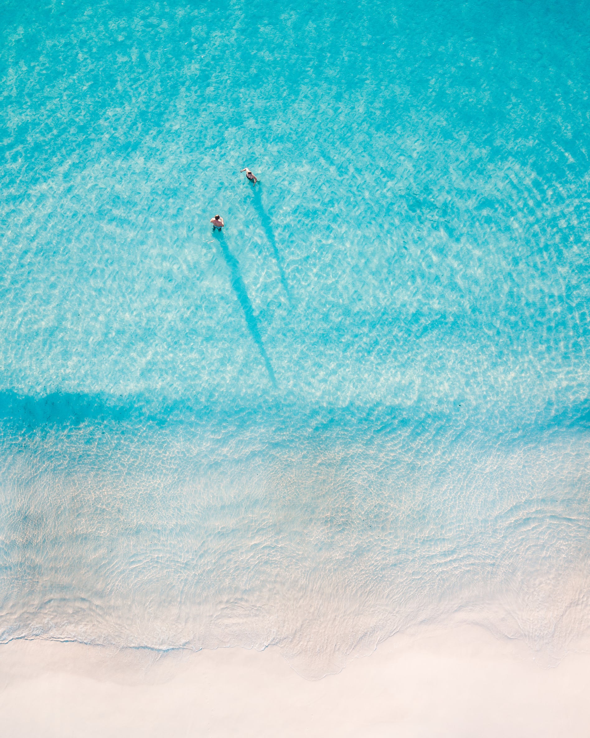 Person Surfing on Blue Sea